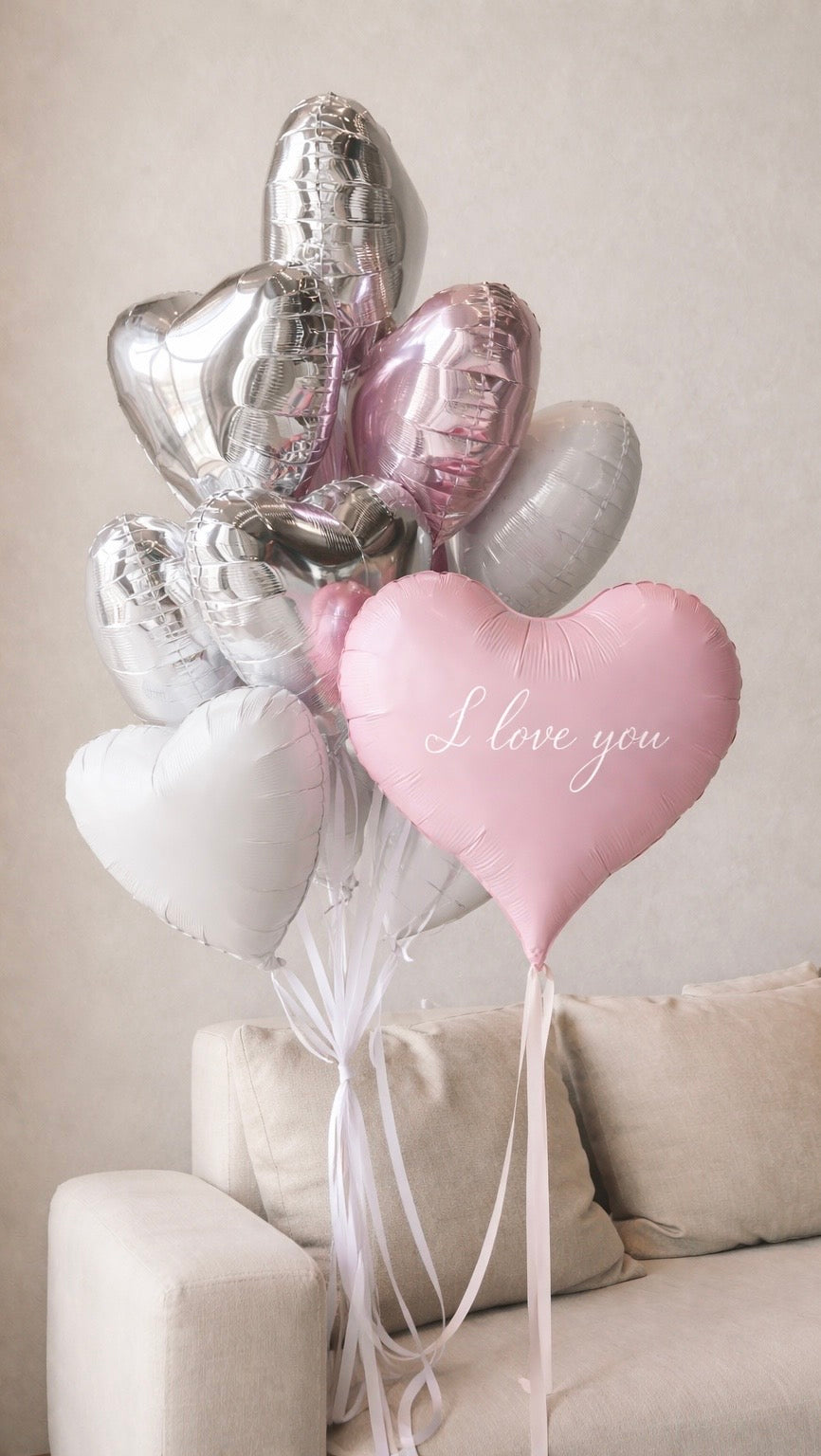 Heart-shaped balloons with 'custom text' 'personalised text'. delivery available in Adelaide