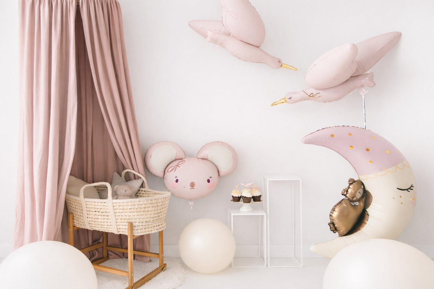 nursery room with foil balloons stork birds, mouse and bear on the moon
