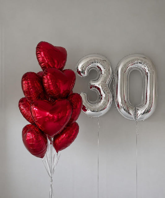 Red heart helium balloon bouquet with silver number 30 balloons