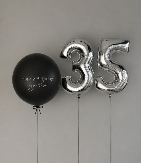 Black personalised jumbo balloon with silver number 35 helium balloon