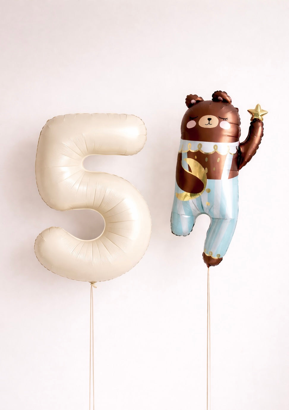 Number 5 balloon and bear-shaped balloon helium filled
