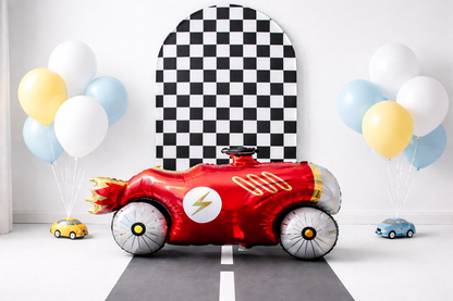 Red race car-shaped foil balloon with latex balloons for birthday in Adelaide.