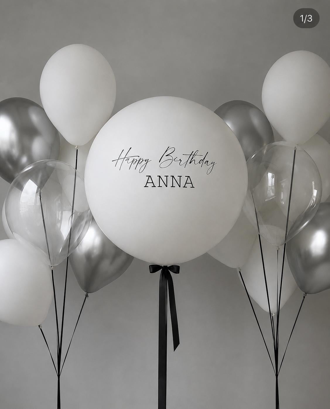 Personalised white jumbo helium balloon with silver, white and clear balloons