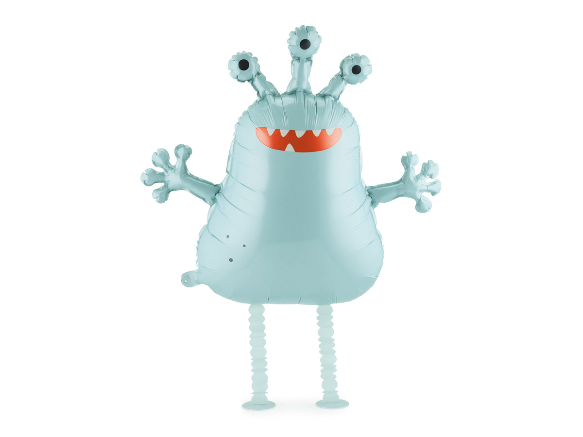 The Alien Edit pastel blue alien foil balloon featuring three eyes, playful outstretched arms, a cheerful orange smile and dangling legs.