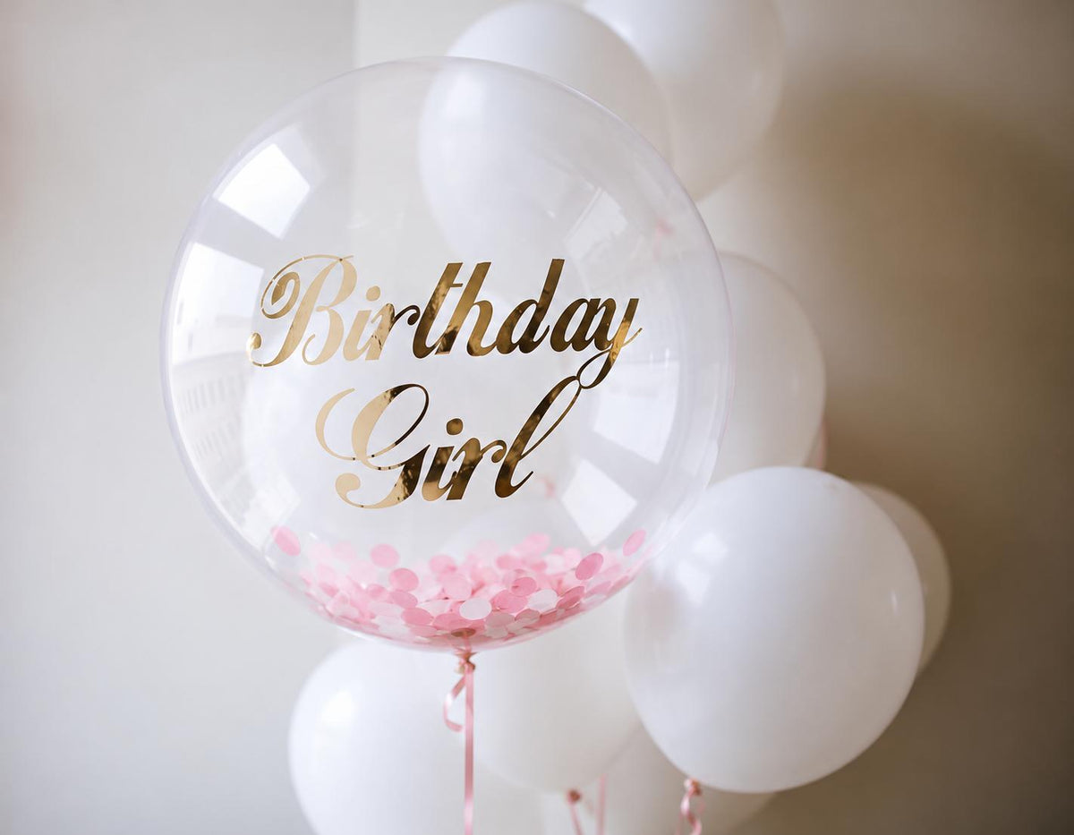 Birthday Girl clear bubble balloon with pink confetti and white helium balloons – birthday balloon delivery Adelaide