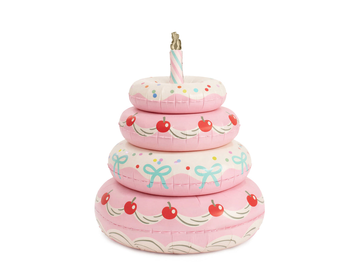 The Cherry Cake Edit air-filled pastel pink tiered birthday cake foil balloon featuring cherry decorations, mint green bows, colourful confetti details and a striped birthday candle, with optional helium latex balloons.