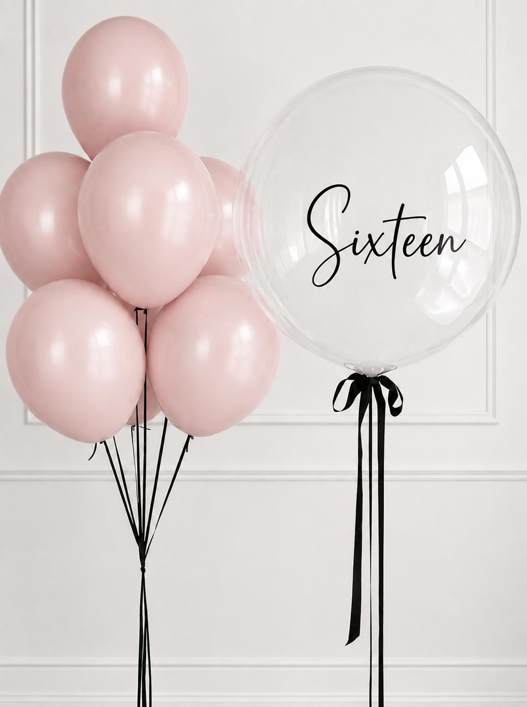 Blush pink helium balloon bouquet with personalised clear bubble balloon for a sixteenth birthday